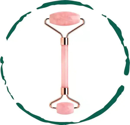 Rose quartz facial roller for skincare, pink gemstone with metal frame, isolated on white