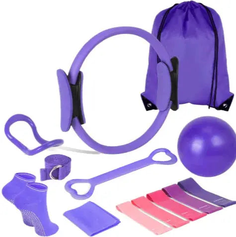 Purple Pilates kit with ring, resistance bands, ball, yoga strap, socks, and drawstring bag