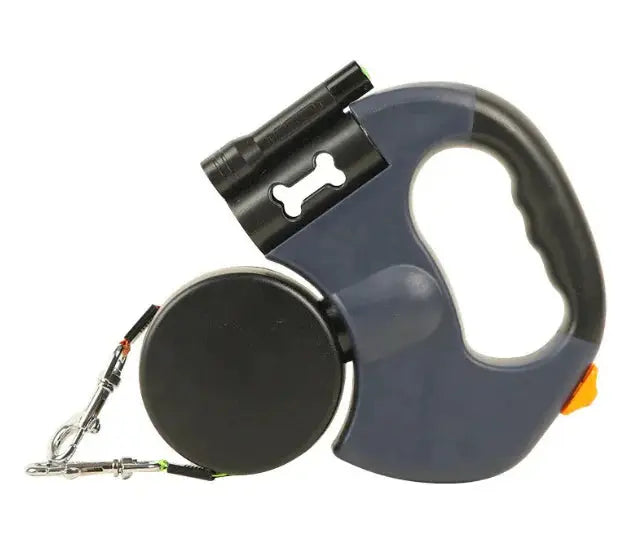 Retractable dog leash with ergonomic handle, built-in waste bag holder, and flashlight