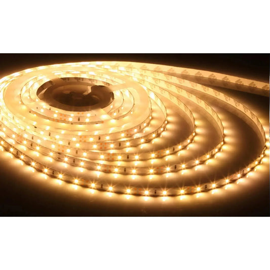 Warm white LED light strip glowing in a dark room, flexible tape lighting
