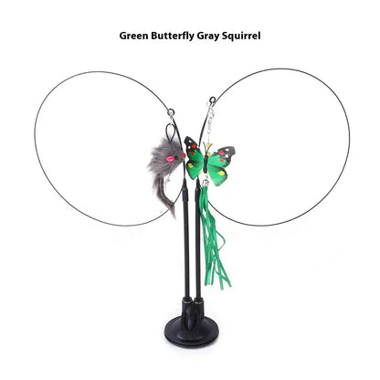 Interactive cat toy with green butterfly, gray squirrel tail, and suction cup base