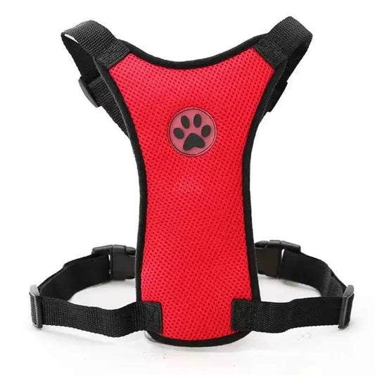 Red mesh adjustable dog harness with black paw print emblem and durable straps