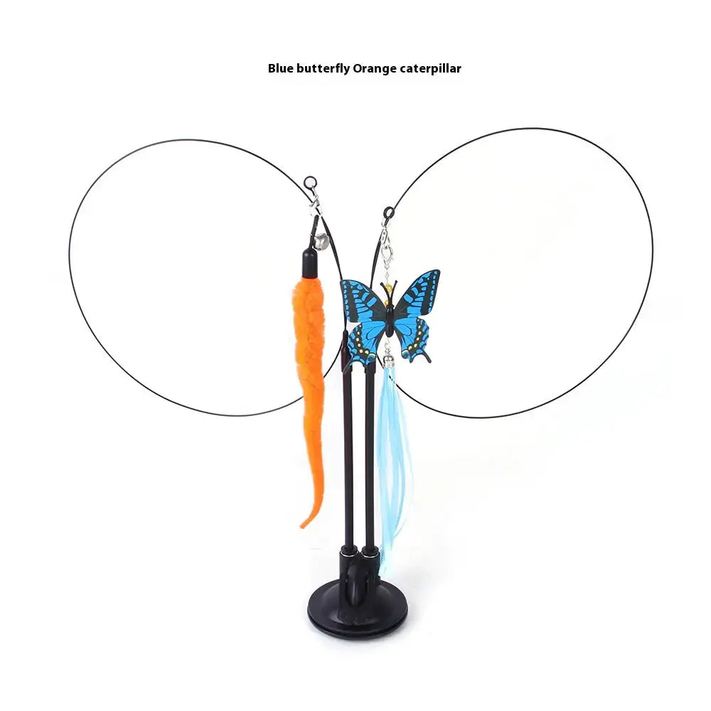 Interactive cat toy with blue butterfly, orange caterpillar, and blue feather attachments on a black base.