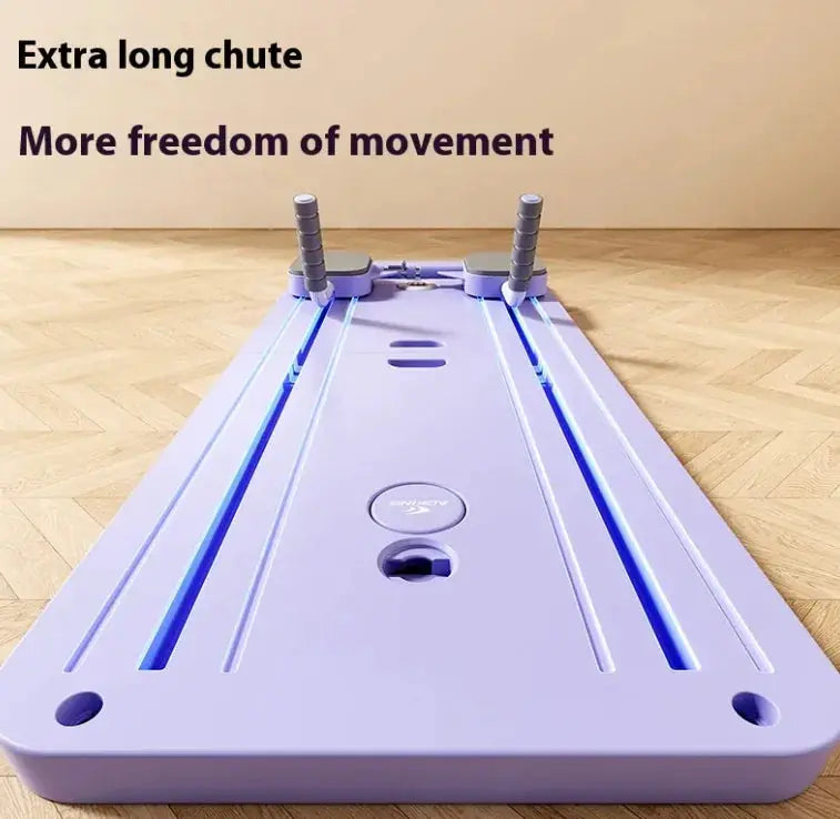 Purple fitness training slider board with long chute and handles, on wooden floor