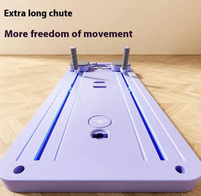 Purple fitness training slider board with long chute and handles, on wooden floor